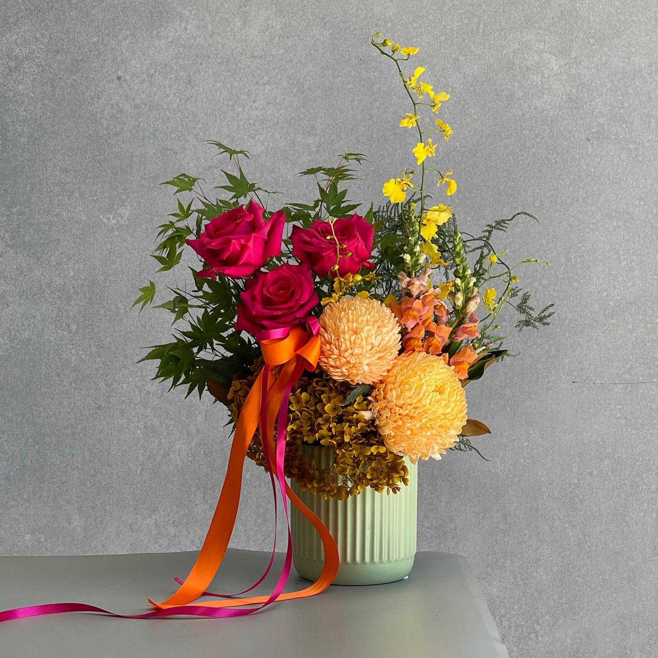 The beautiful Bright and Joyful flower Arrangement Deluxe size suitable for any occasion.