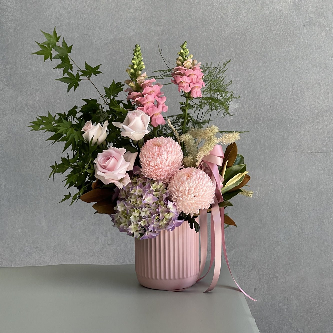 Pink Bliss Deluxe floral arrangement suitable for any occasion.